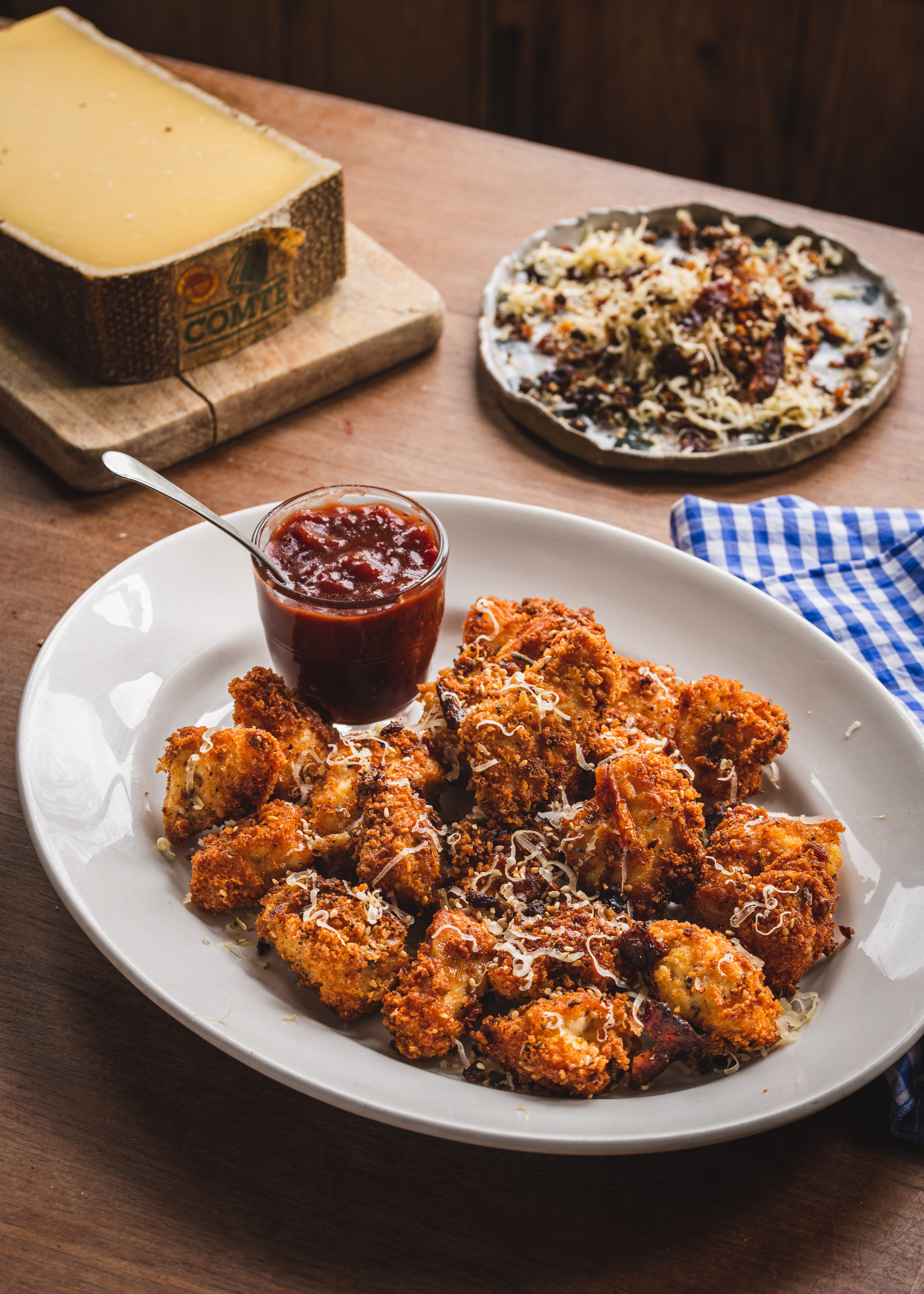 Comté & sesame popcorn chicken with spicy plum ketchup